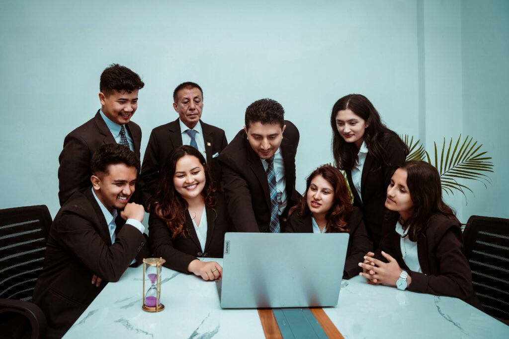 A Group of People with a Laptop